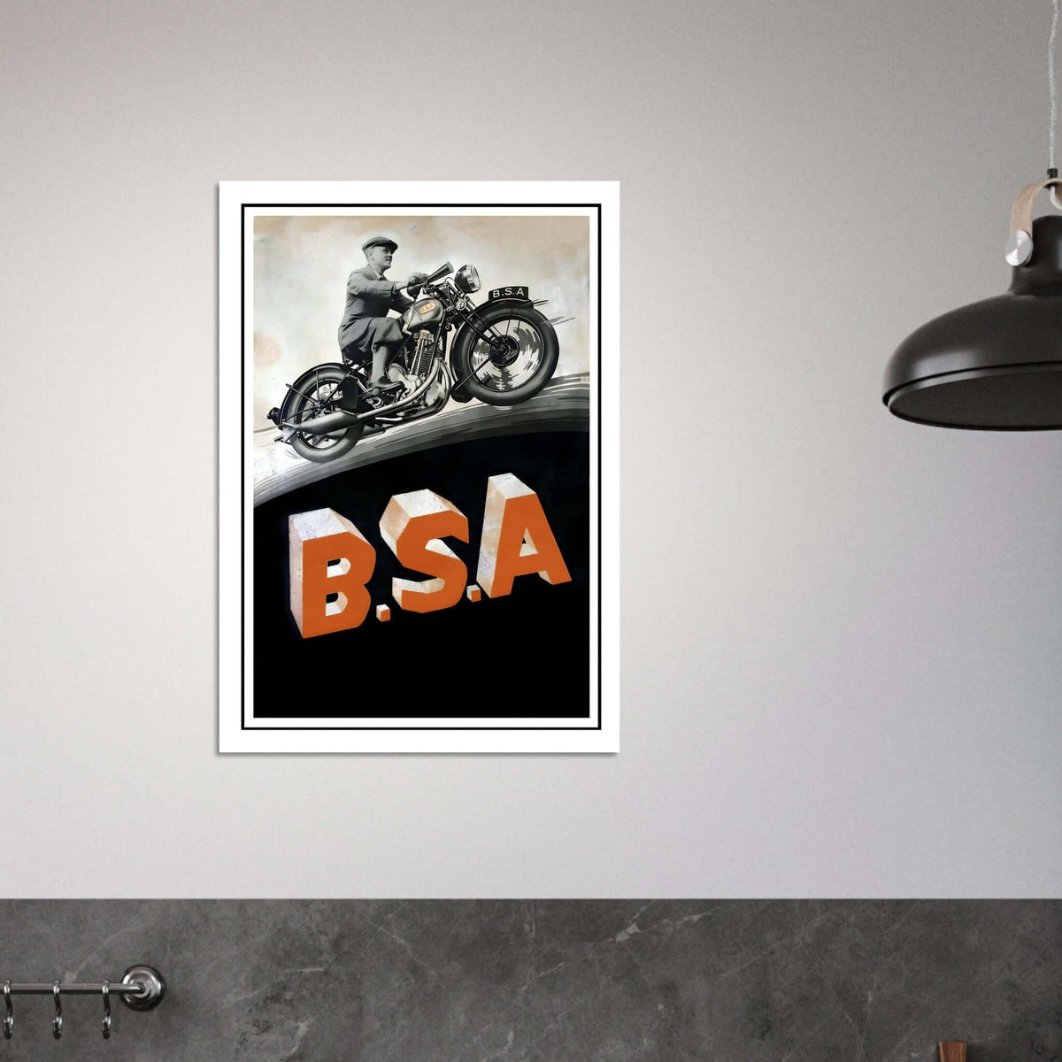 Classic BSA motorcycle poster featuring a man on a vintage motorcycle over bold B.S.A. letters.