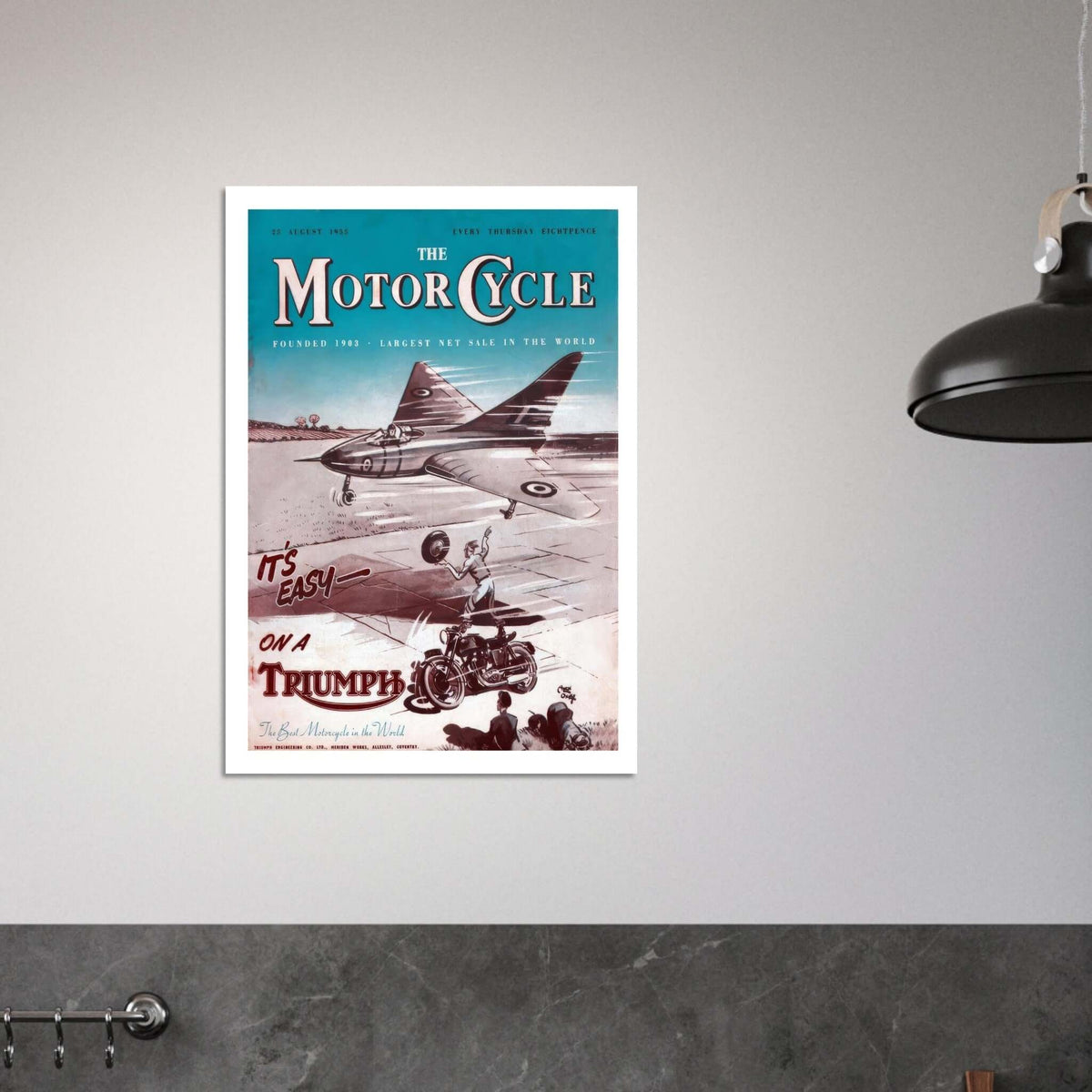 vintage Triumph motorcycle advertisement featuring a motorcyclist and a jet plane with the text 'It's easy on a Triumph'.