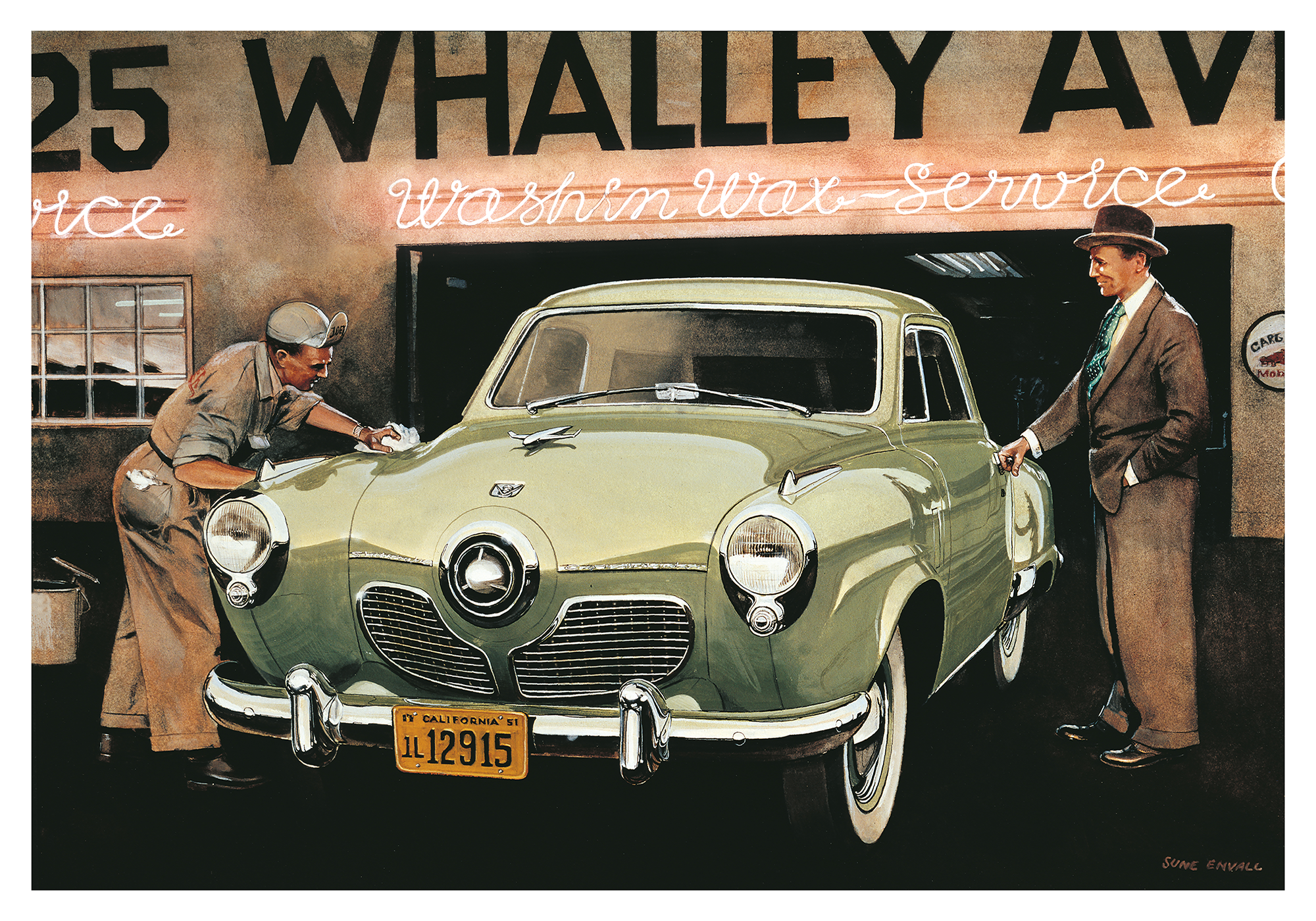 A classic Studebaker being picked up from the car wash.